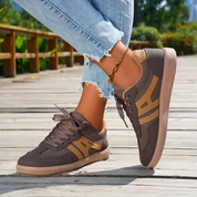 Brown and beige retro sneakers close-up detail