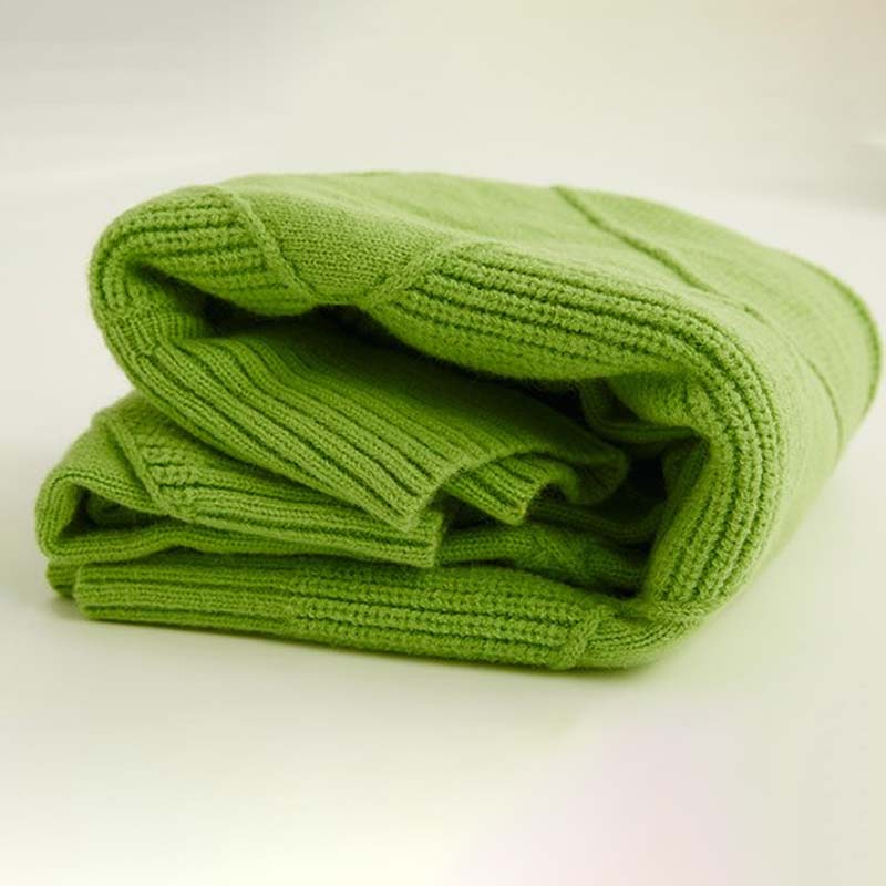 Gebreide trui groen opvouw detail