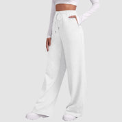 Dames trainingsbroek witte fluweelachtige stof met zakken front view