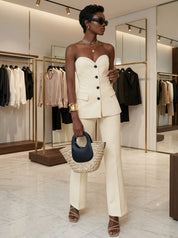 Create a new fashion ecommerce image based on the original image and follow these rules strictly. Keep the original pose type: if the model is shown from the back, keep a back view; if from the front, keep a front view; if the model is sitting, keep the model sitting; and if the original image is a close-up, maintain a close-up framing. You may vary the pose slightly to make it feel natural, but do not change the overall pose category. Fill the frame as much as possible with the model so there is minimal em