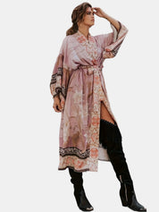 Pink floral robe with lace trim, studio side view