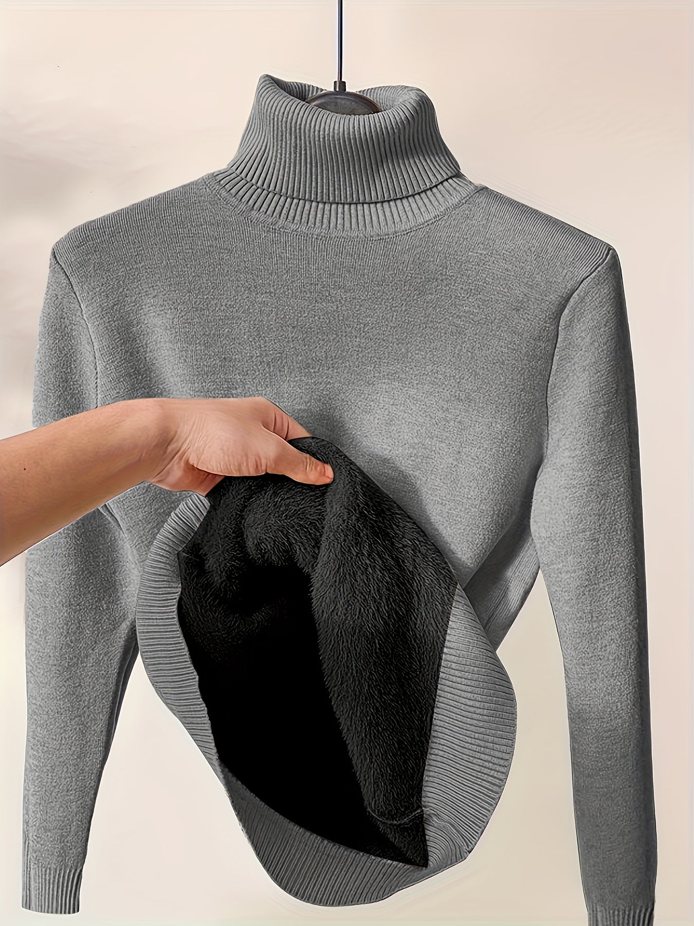Gebreide trui grijs turtle neck detail shot