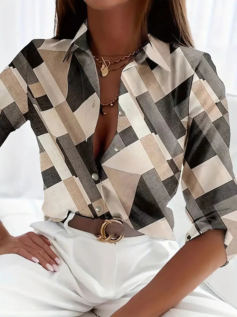 Blouse with geometric blocks in black and white, front view
