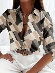 Blouse with geometric blocks in black and white, front view