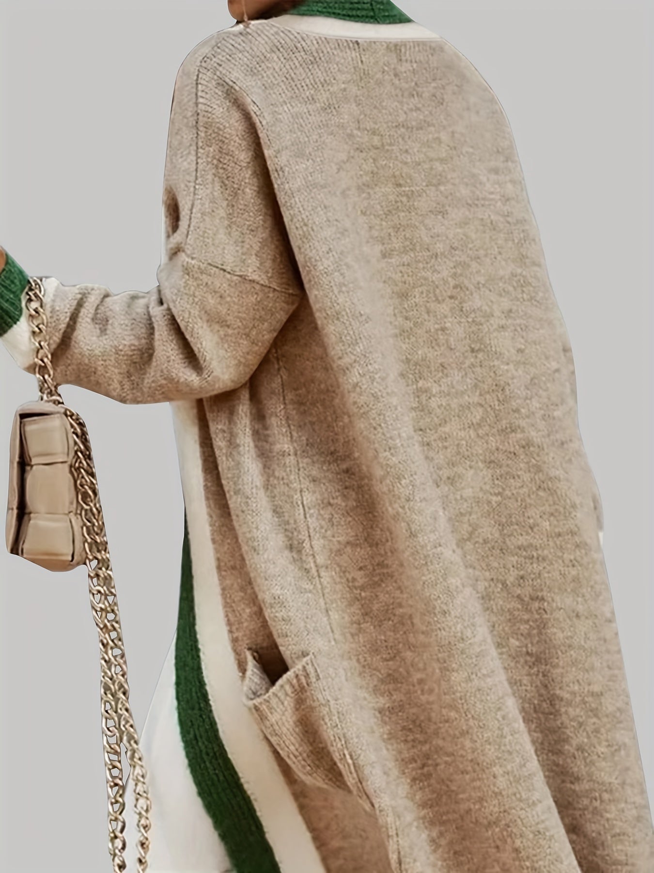 Open trui beige met colorblock design en zakken, detail schouder