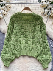 Gebreide trui groen met ronde hals en textuur detail
