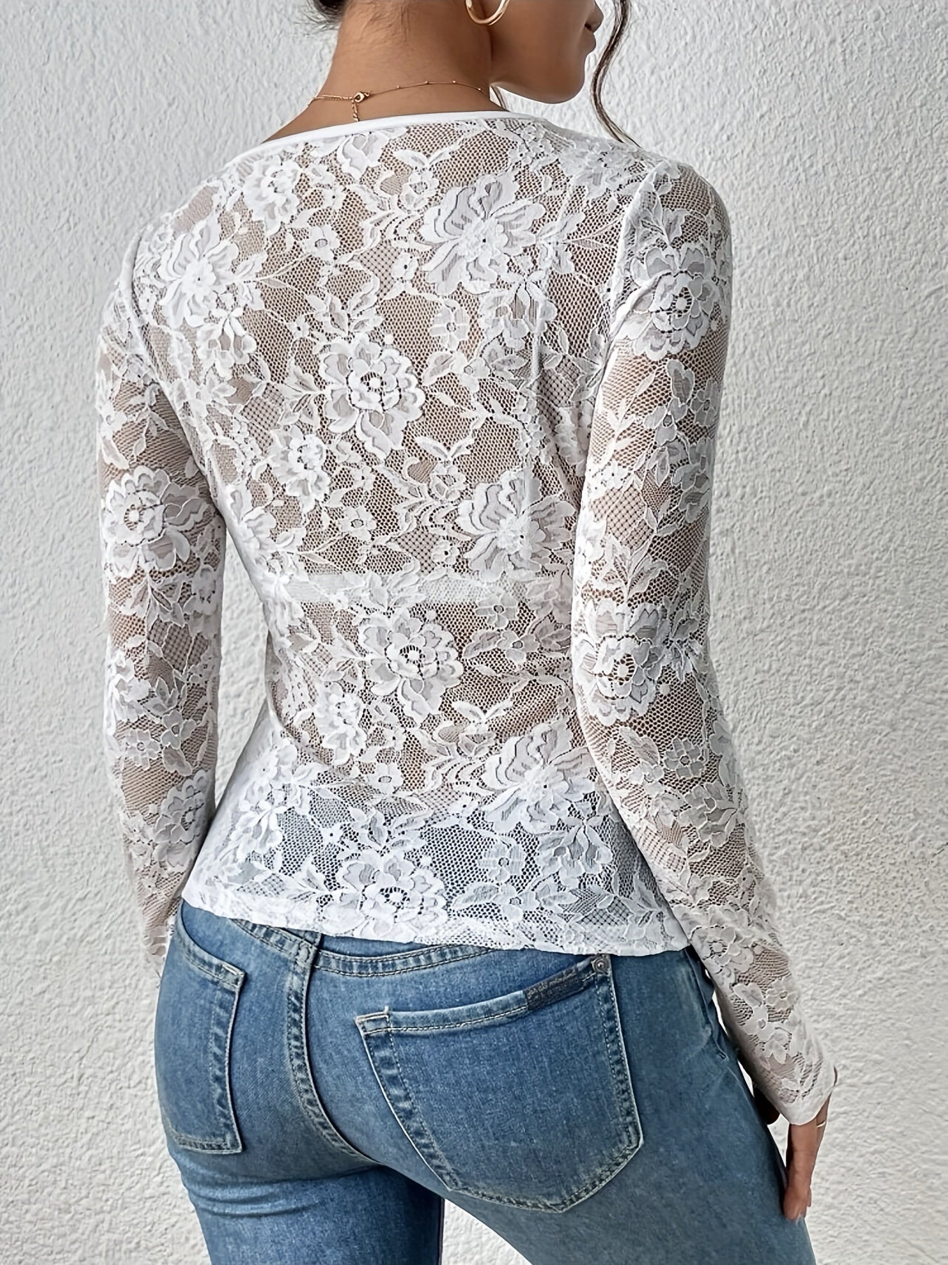 White lace bodysuit with V-neck back view