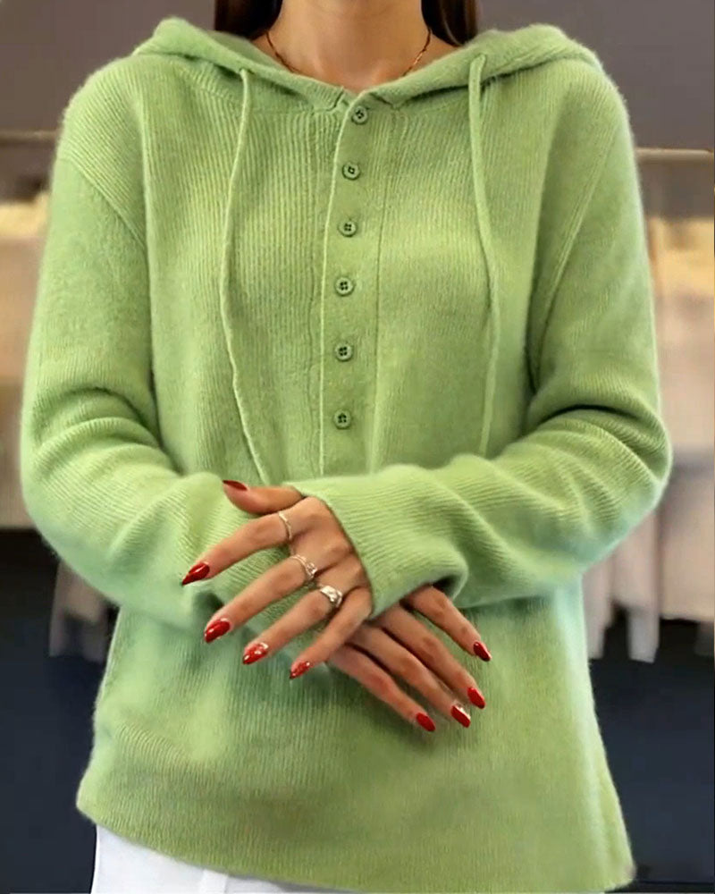 Groene gebreide hoodie met knopen vooruitschot