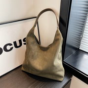 Beige suede hobo bag front view