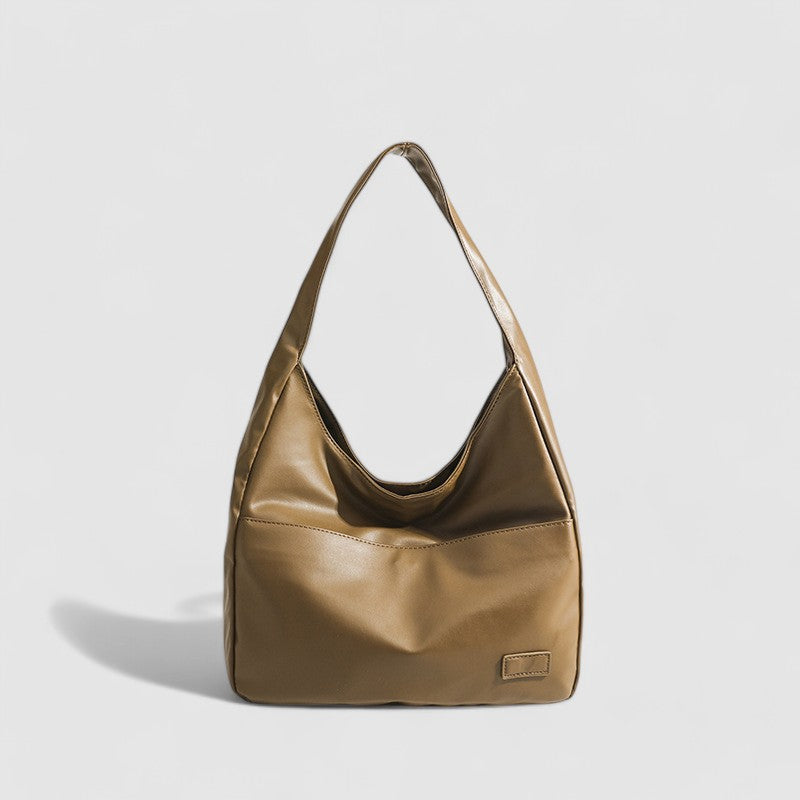 Tan leather slouchy shoulder bag front view