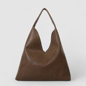Brown vegan leather shoulder bag angled view