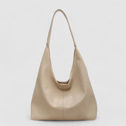 Beige leather hobo bag front view