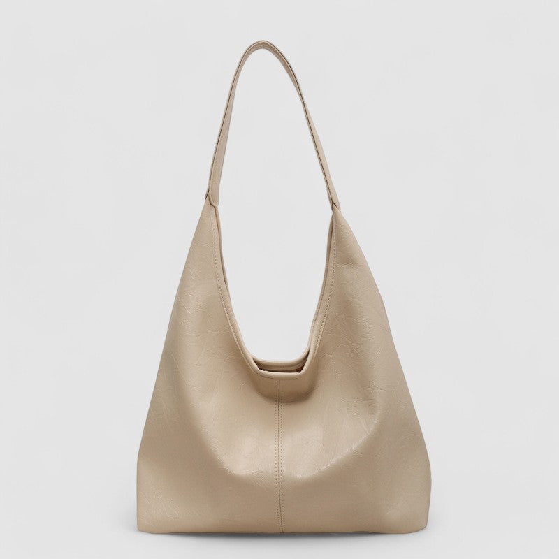 Beige leather hobo bag front view