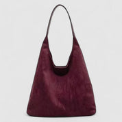 Maroon suede hobo bag front view