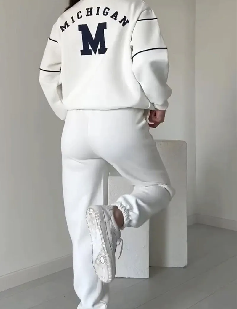 White half-zip tracksuit with black stripes back view