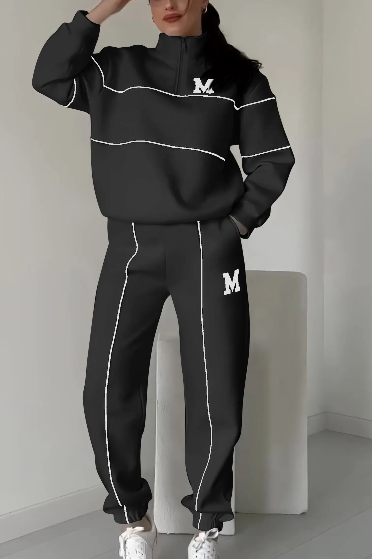 Black half-zip tracksuit with white stripes front view