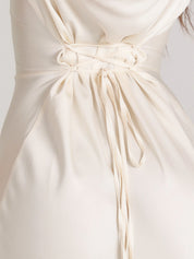 White maxi dress with tie waist detail close-up