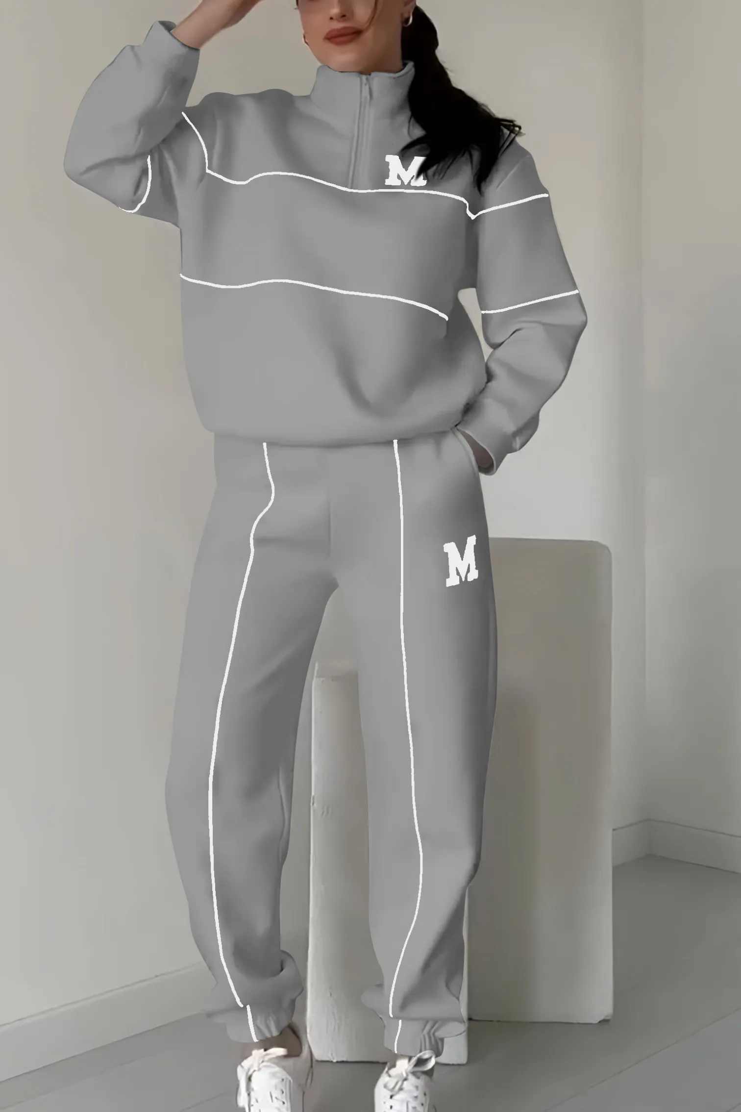 Gray half-zip tracksuit with white stripes front view
