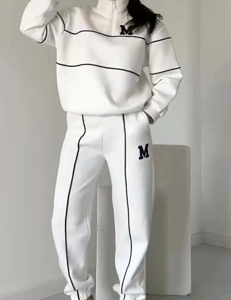 White half-zip tracksuit with black stripes front view