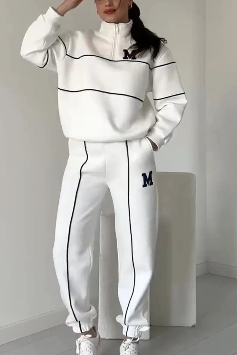 White half-zip tracksuit with black stripes front view