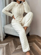 Cream plush onesie with hood and zipper, front view
