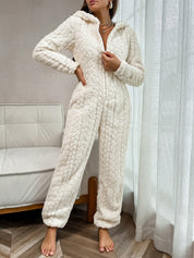 Cream plush onesie with hood and zipper, side profile