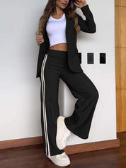 Black track suit with white stripes front view
