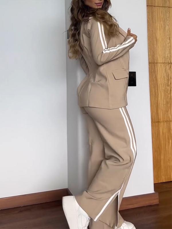 Beige track suit with white stripes three-quarter view
