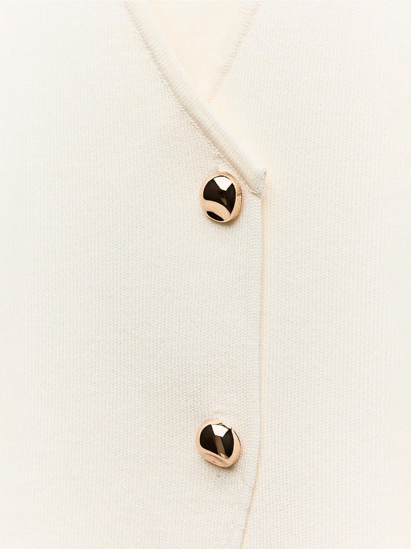 Gilet top wit met gouden knopen detailopname