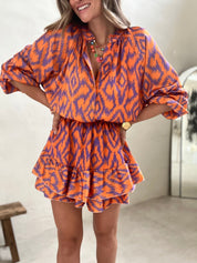 Orange and purple patterned summer dress full-body front view