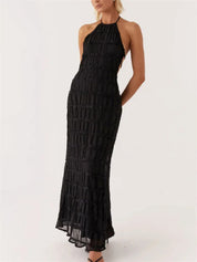 Maxi-jurk zwart met open rug en plooien detail