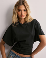 Black crop top with dolman sleeves front view