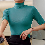 Coltrui groen met hoge hals en korte mouwen front view