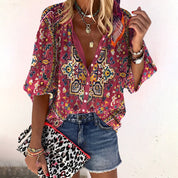 Bohemian blouse pink with geometric print and ruffled sleeves