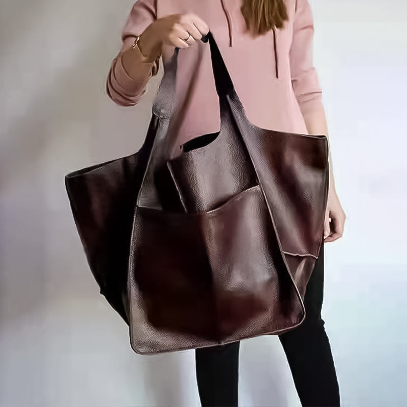 Brown slouchy tote with large exterior pockets, front view