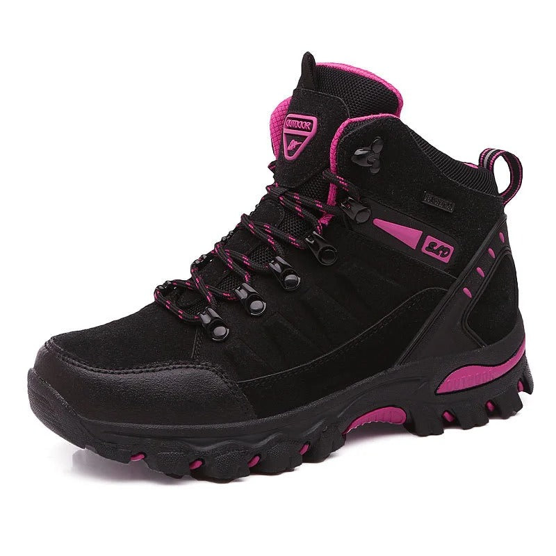 Black outdoor boots with pink accents front view