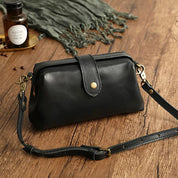 Black leather crossbody bag front view