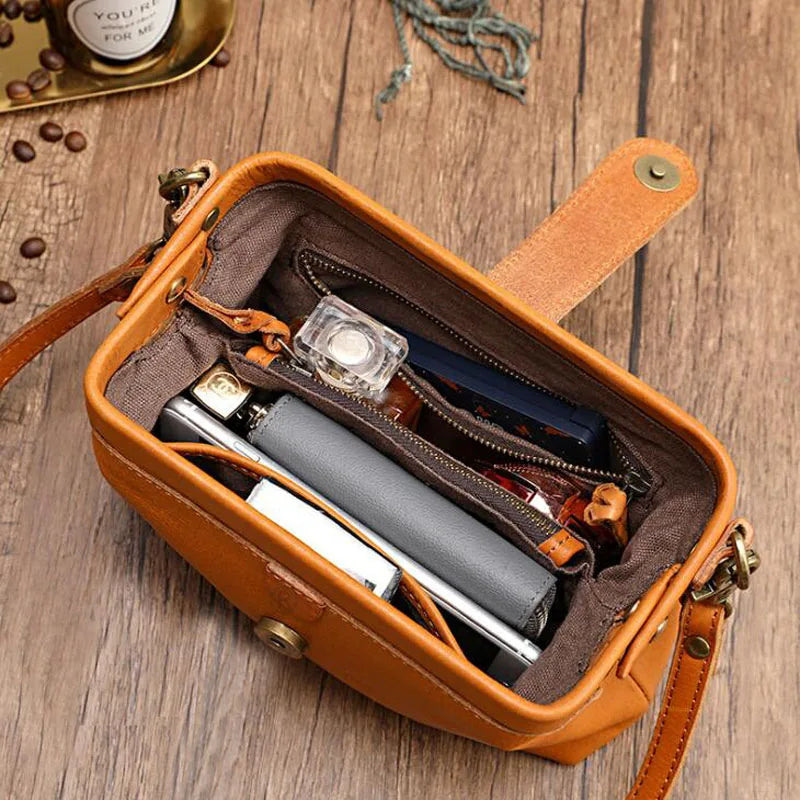 Orange leather crossbody bag interior detail
