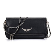 Black leather clutch with silver chain and wing embellishment, front view