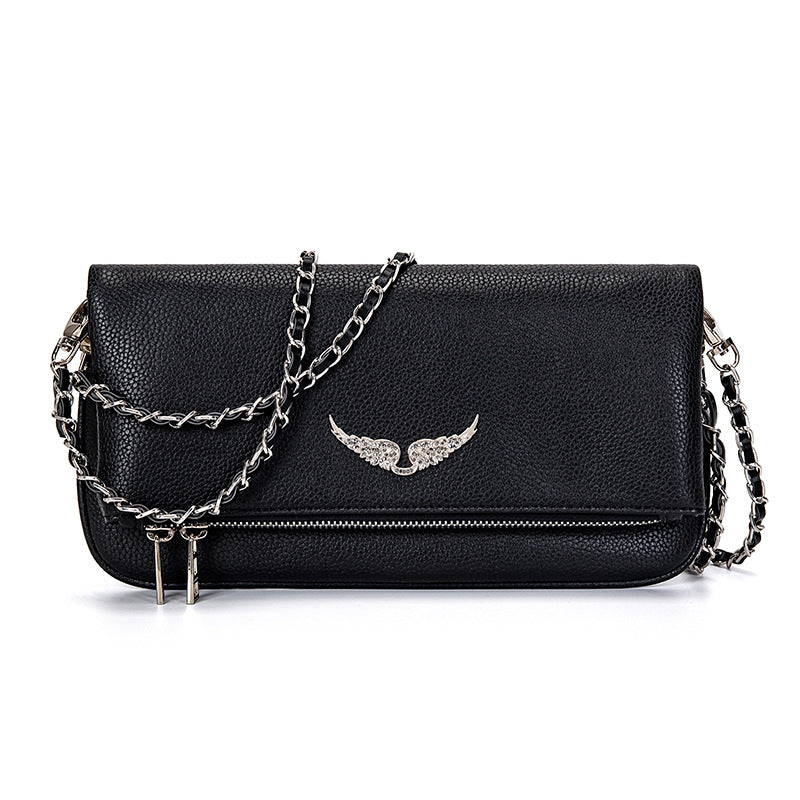 Black leather clutch with silver chain and wing embellishment, front view