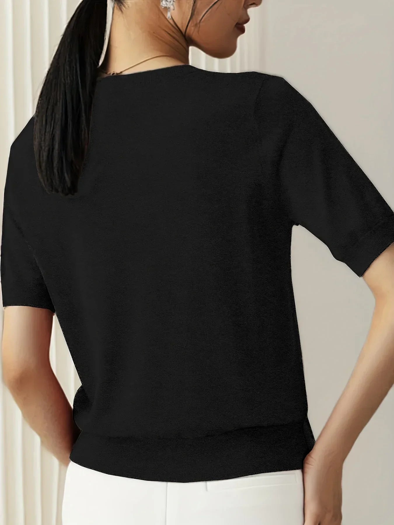 Knitted top black short sleeves back view